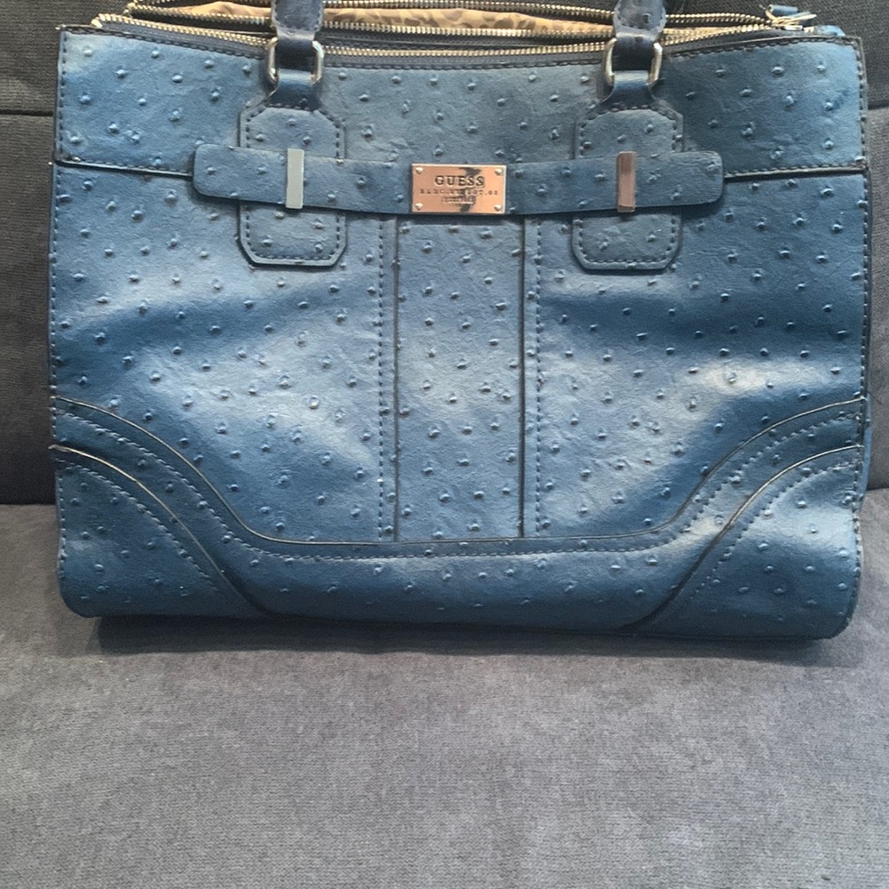 Guess Ostrich Purse It’s Has Two Zippers And Button Up In the Middle